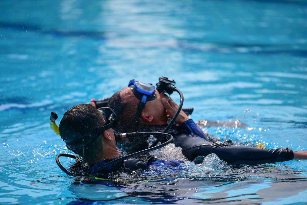 Diver Rescuing Buddy in Water Accident